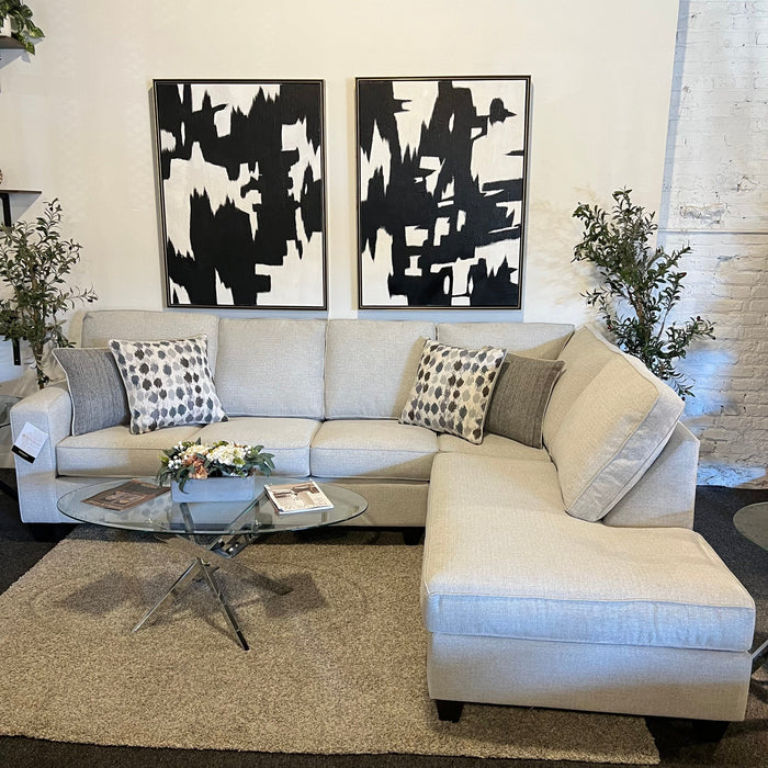 Cream Two Piece Sectional Couch with Right Chaise