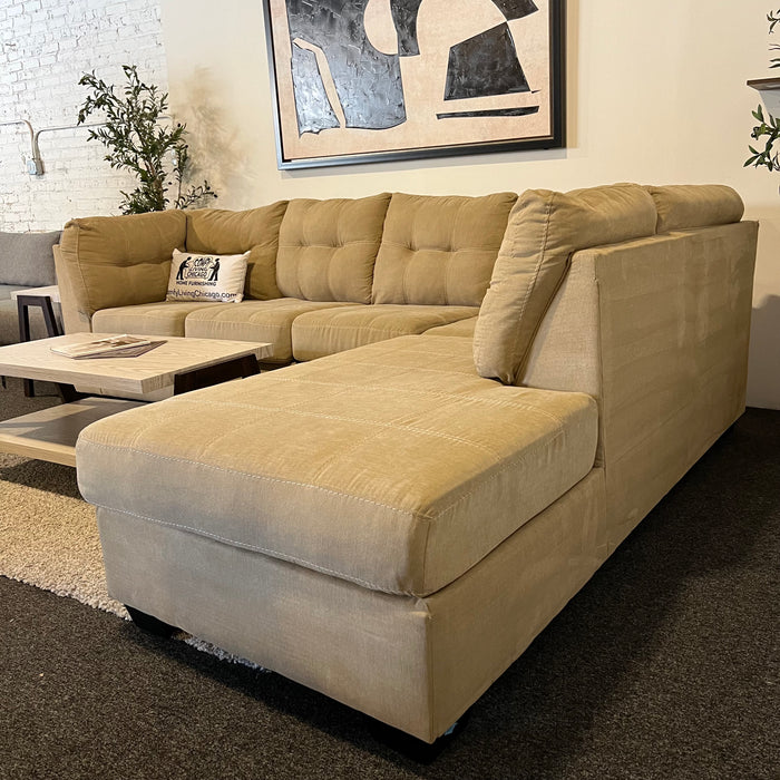 Ashley Home-stores Two Piece Sectional Couch with Chaise in Tan