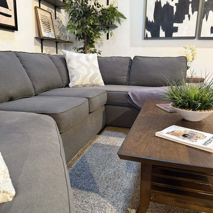 Walter E Smithe Sectional with Bumper Chaise & Cuddle Corner