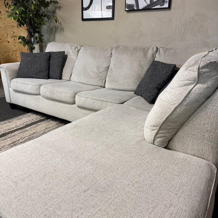Cream Sectional with Bumper Chaise