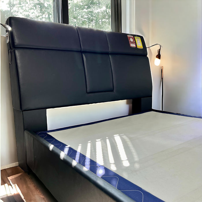 Fully Upholstered Bed in a black PU Fabric with Reading Lights, Bluetooth Speakers, and USB Charging ports