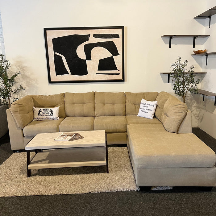 Ashley Home-stores Two Piece Sectional Couch with Chaise in Tan