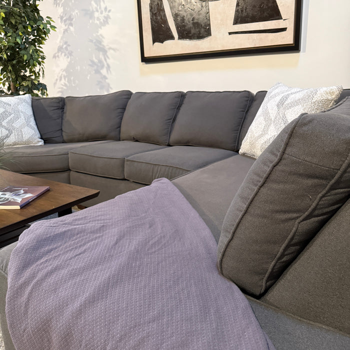 Walter E Smithe Sectional with Bumper Chaise & Cuddle Corner