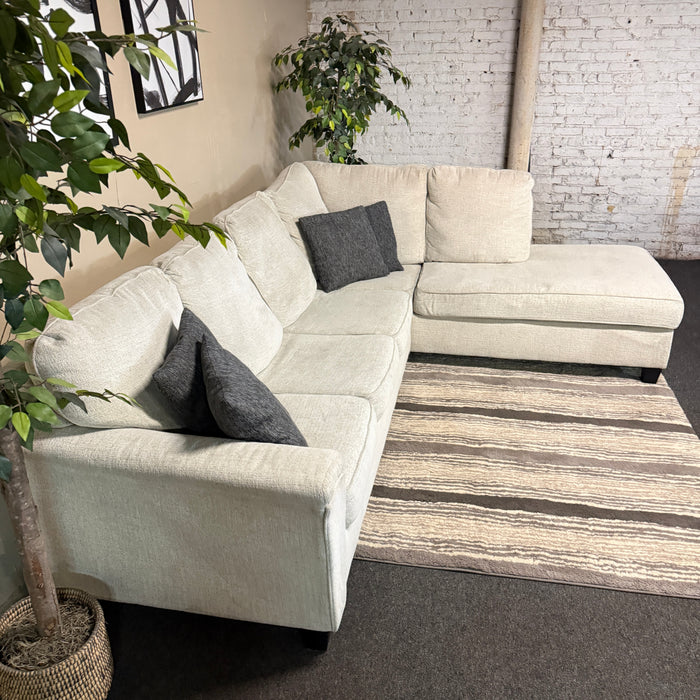Cream Sectional with Bumper Chaise