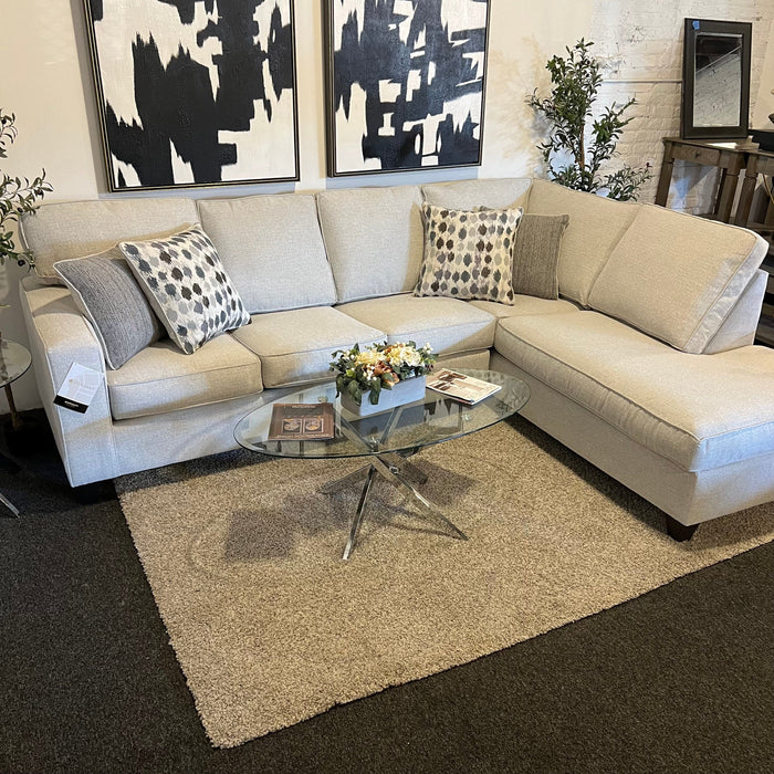 Cream Two Piece Sectional Couch with Right Chaise