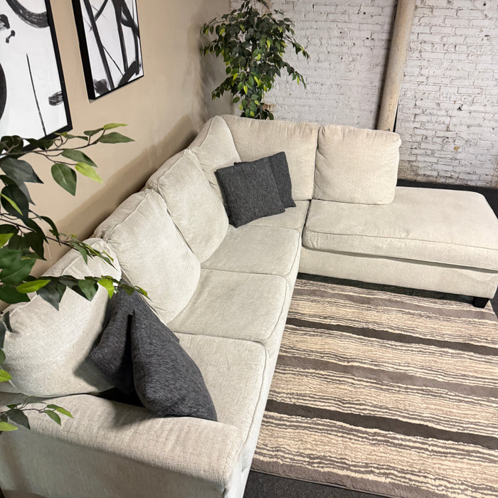 Cream Sectional with Bumper Chaise
