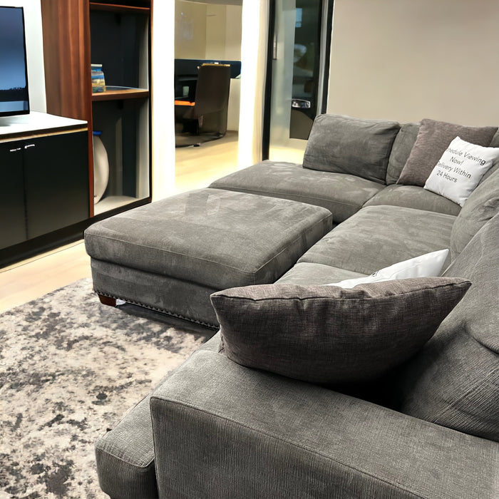 Lovely Gray Two Piece Sectional Couch with Right Chaise and Matching Ottoman