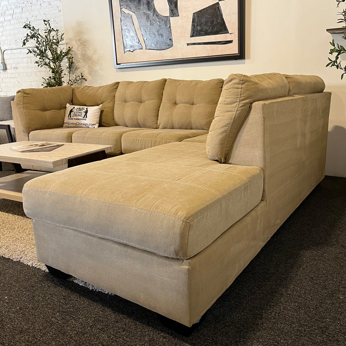 Ashley Home-stores Two Piece Sectional Couch with Chaise in Tan