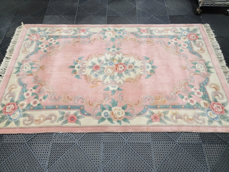 60x99 Pink Wool Area Rug