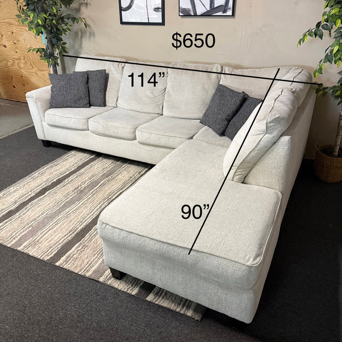 Cream Sectional with Bumper Chaise