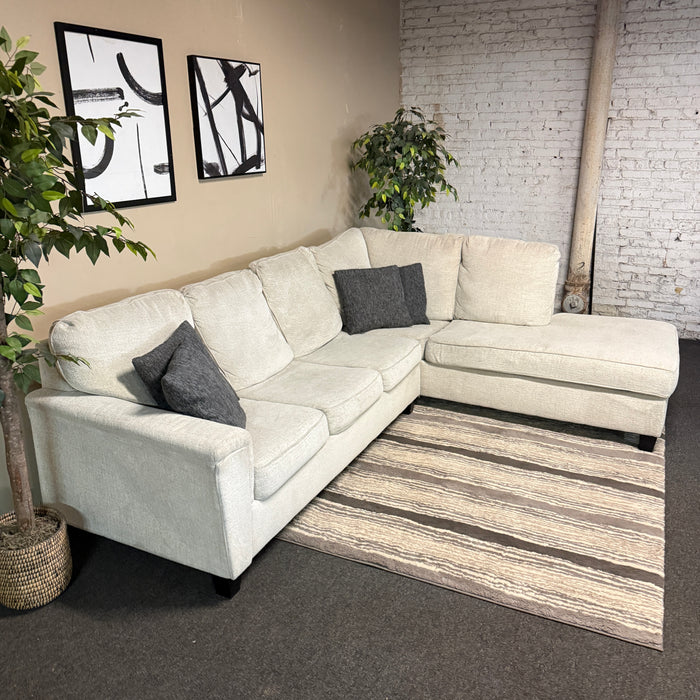 Cream Sectional with Bumper Chaise