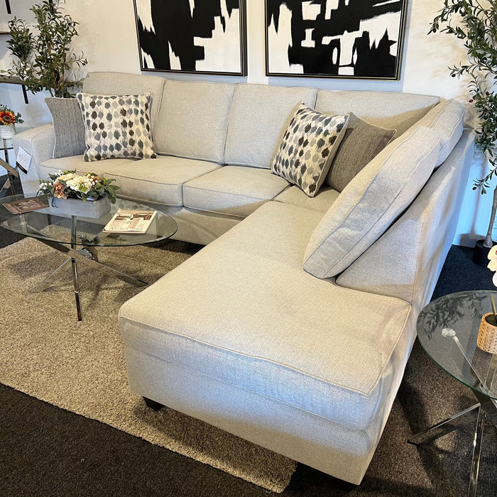 Cream Two Piece Sectional Couch with Right Chaise